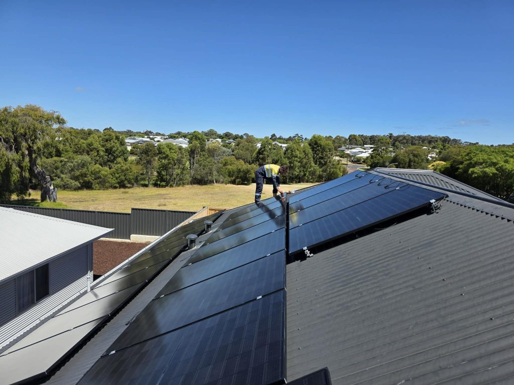 Top Rated Solar and Battery Installation Electrician on a tin roof